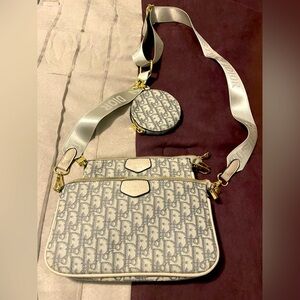 Cute crossbody bag with detachable/additional coin purse and wristlet.